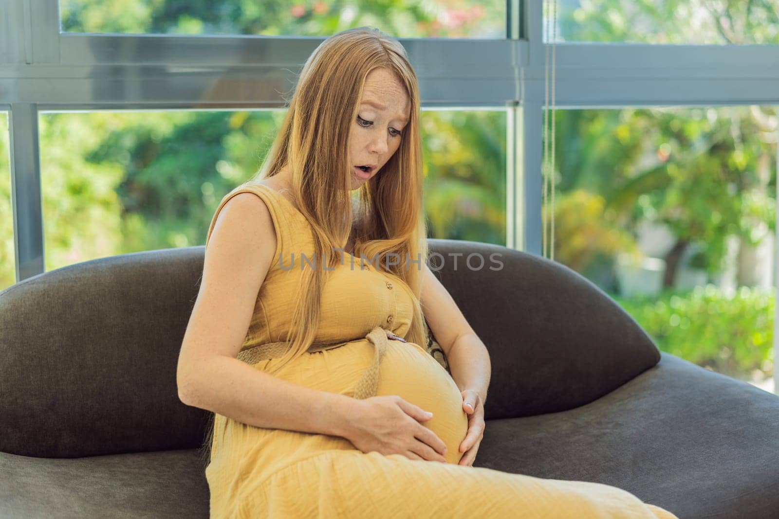 Expectant woman experiences discomfort, feeling unwell during pregnancy by galitskaya