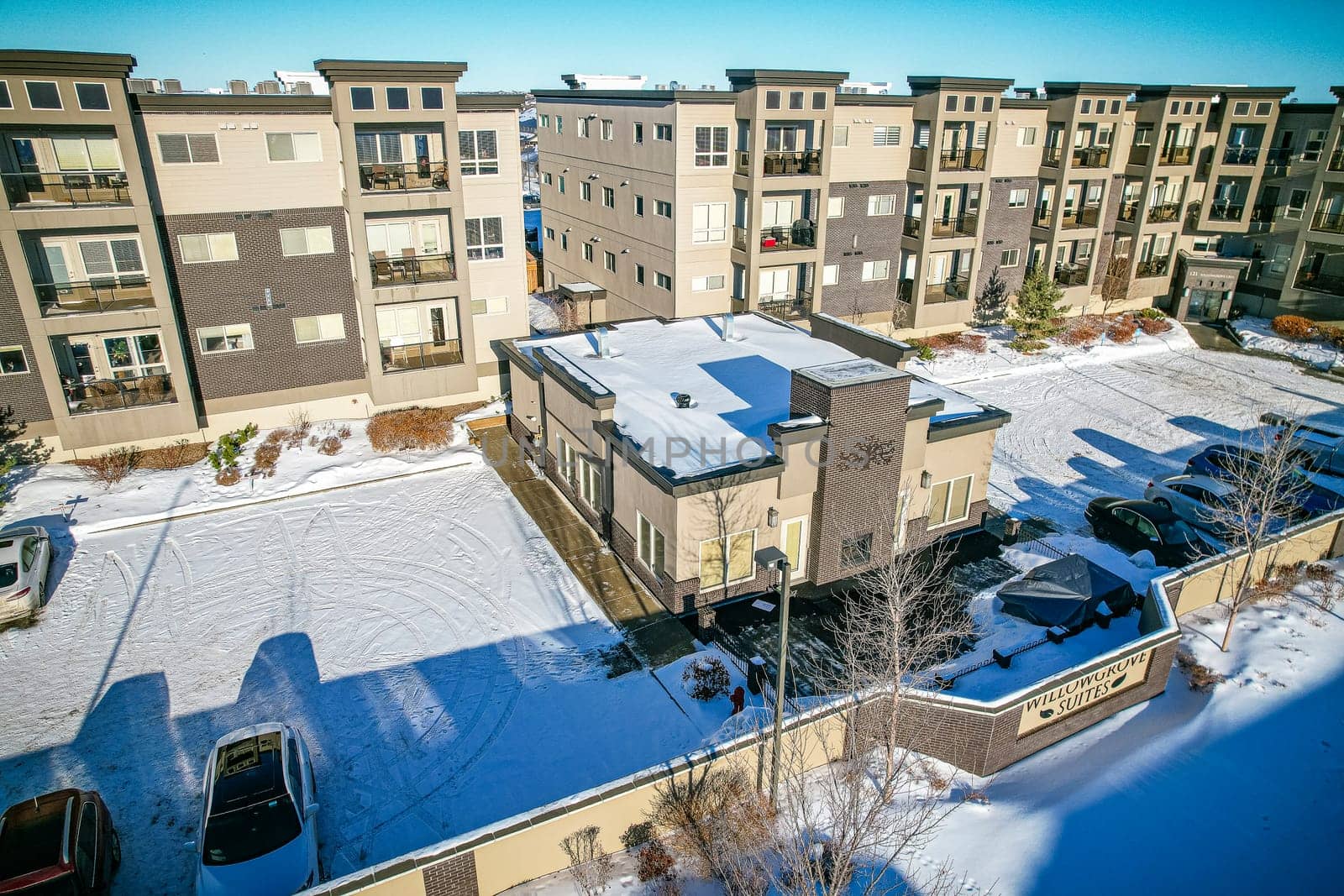 Drone shot over Willowgrove, Saskatoon, highlighting its residential beauty, modern streets, and vibrant community spaces.