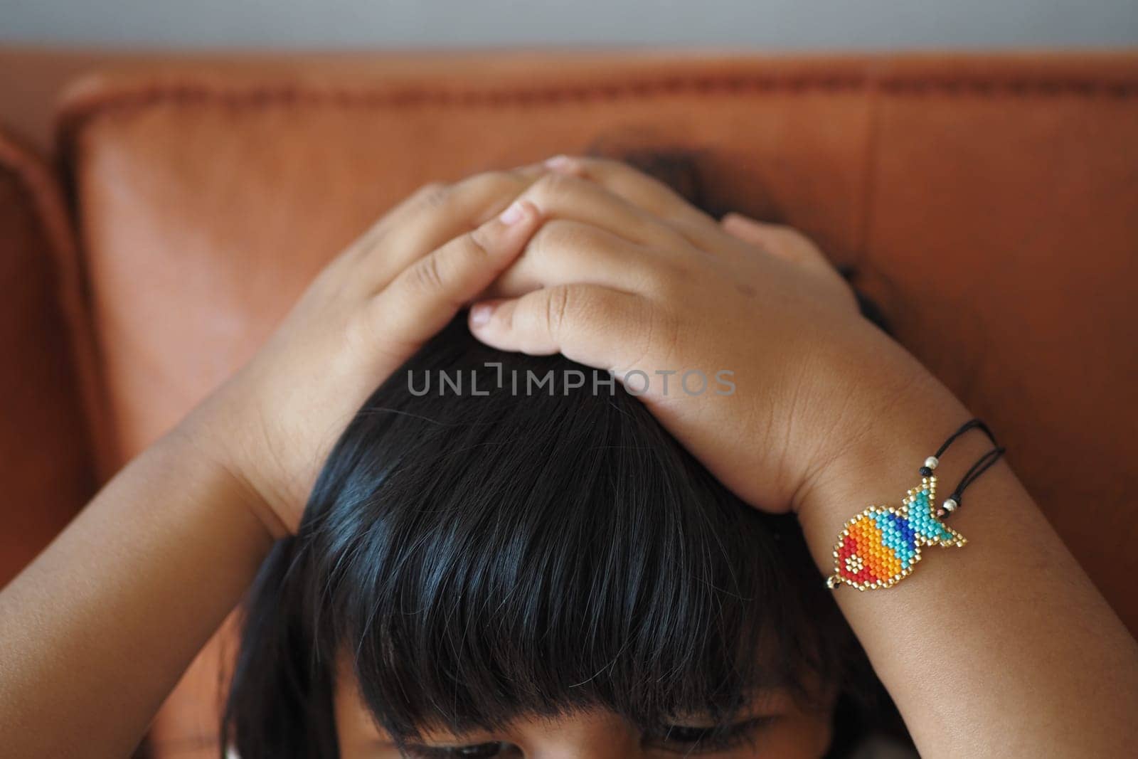 child Scratching his Head closeup by towfiq007