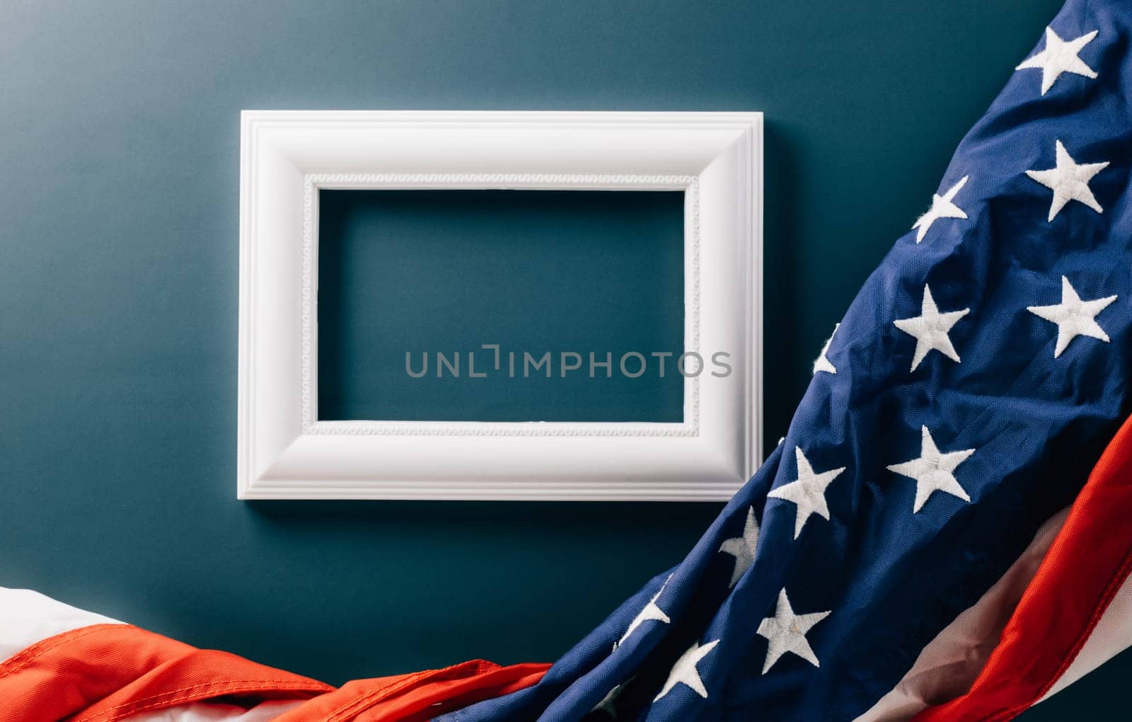 Top view USA flag for Memorial day on abstract blue background by Sorapop