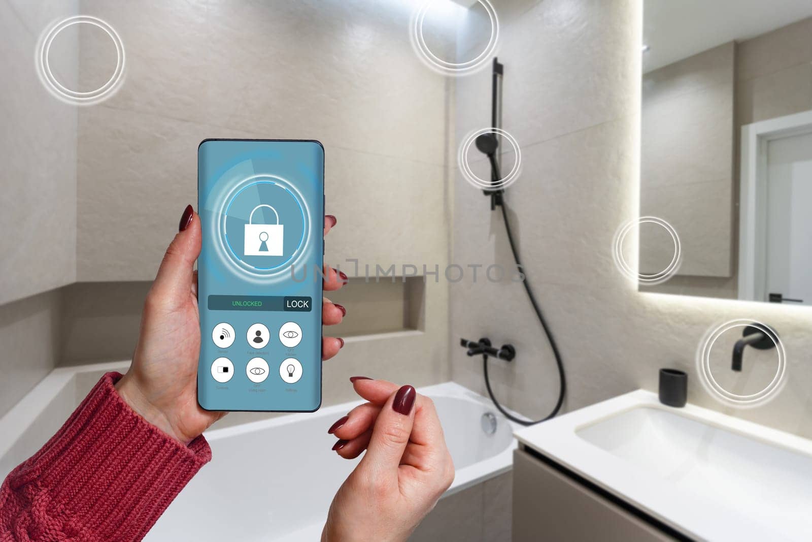 All the house in a phone. Close up of young woman user hands controlling electronic objects in modern luxury studio apartment via smart home interface on cell screen. Internet of things ios technology by Andelov13