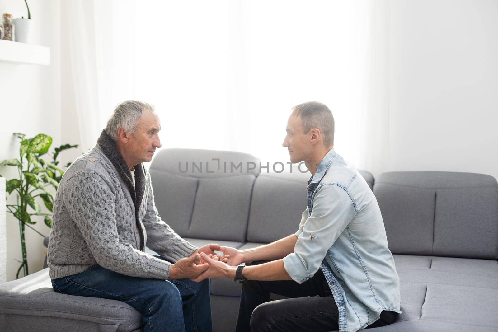 Elderly son takes care of ill father by Andelov13