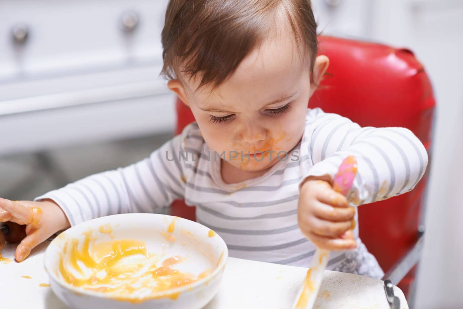 Eating, vitamins and boy baby in chair with vegetable food for child development at home. Organic, nutrition and sweet hungry kid or toddler enjoying healthy lunch, dinner or supper meal at house. by YuriArcurs