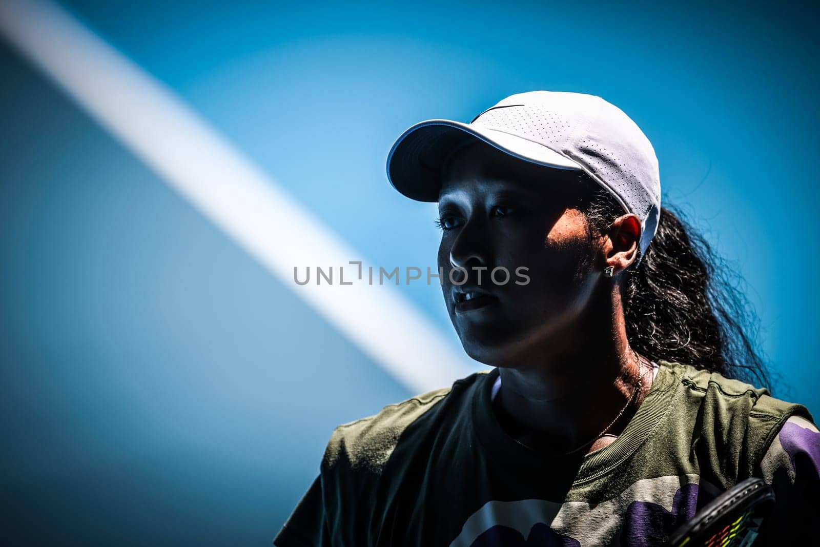 MELBOURNE, AUSTRALIA - JANUARY 12: Naomi Osaka of Japan practices with Ons Jabeur of Tunisia ahead of the 2024 Australian Open at Melbourne Park on January 12, 2024 in Melbourne, Australia.