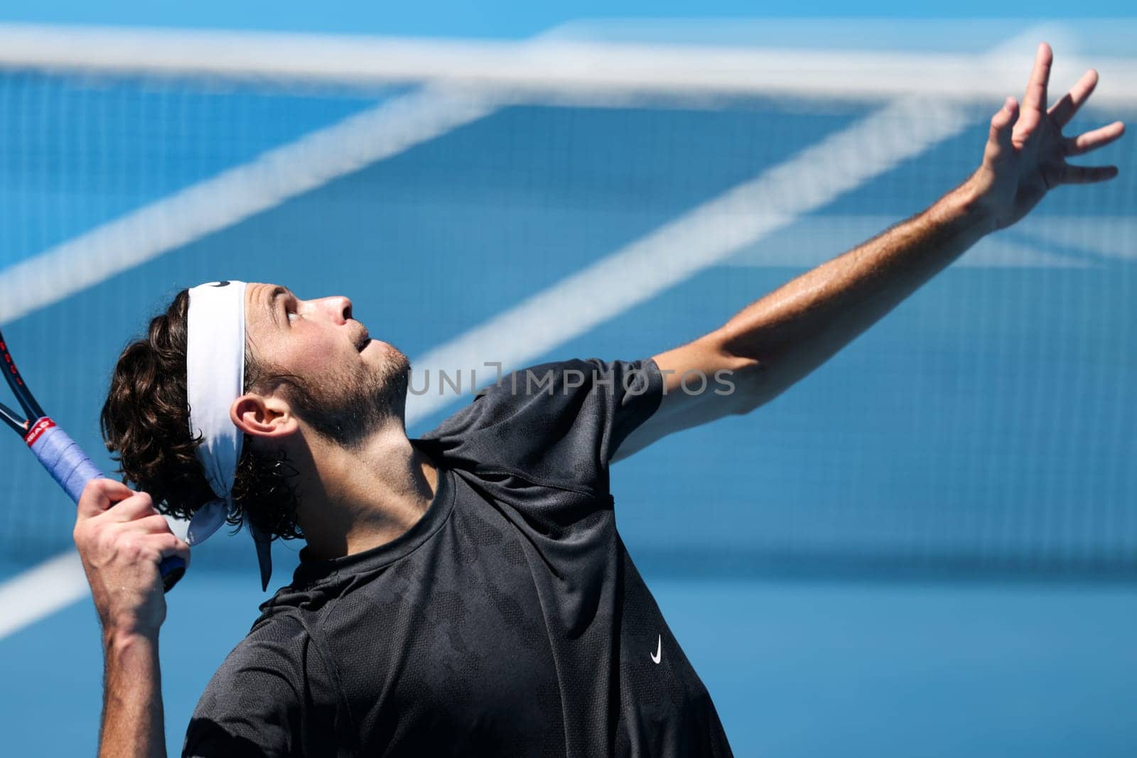 MELBOURNE, AUSTRALIA - JANUARY 12: Taylor Fritz of USA practices with Daniil Medvedev of Russia ahead of the 2024 Australian Open at Melbourne Park on January 12, 2024 in Melbourne, Australia.