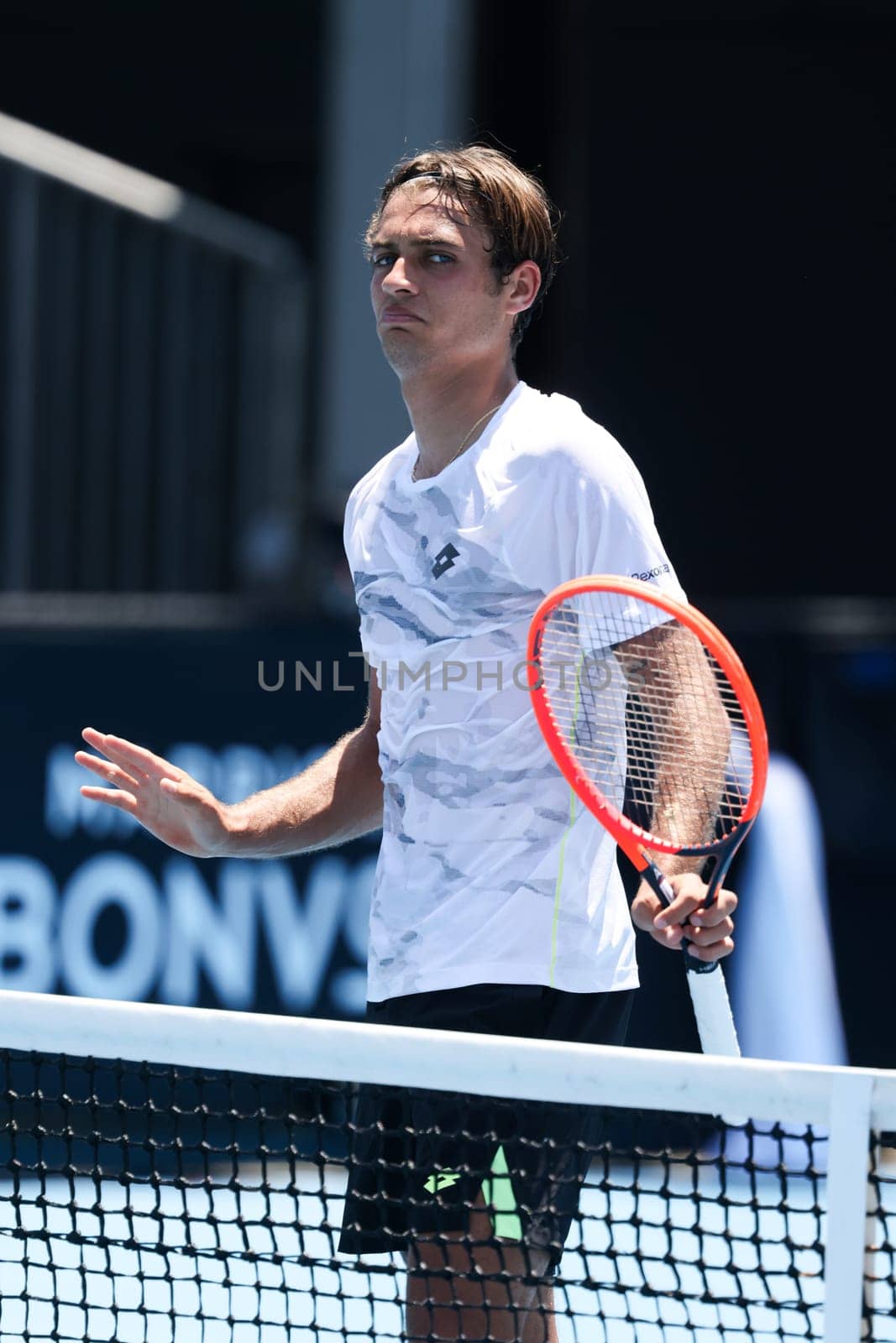 MELBOURNE, AUSTRALIA - JANUARY 12: Flavio Cobolli of Italy on his way to beating Santiago Fa Rodriguez Taverna of Argentina in qualifying Atmosphere ahead of the 2024 Australian Open at Melbourne Park on January 12, 2024 in Melbourne, Australia.