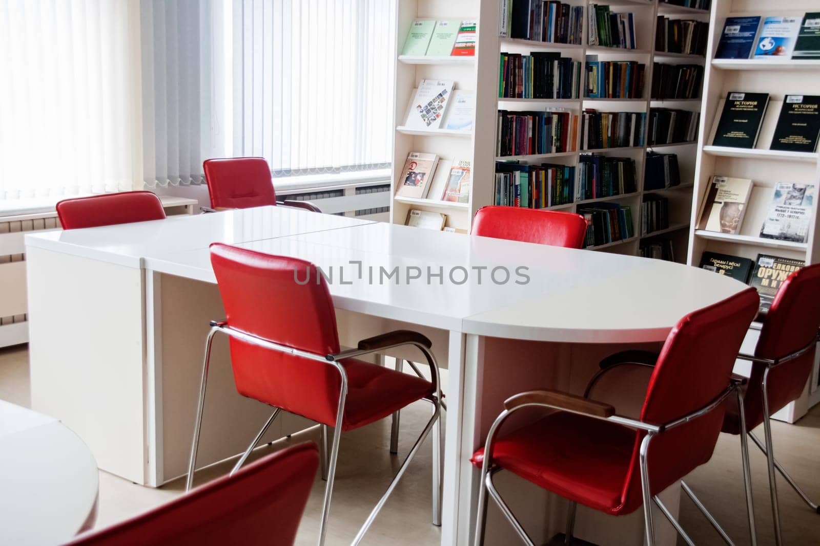 Belarus, Minsk - 18 september, 2019: A table in the library by Vera1703