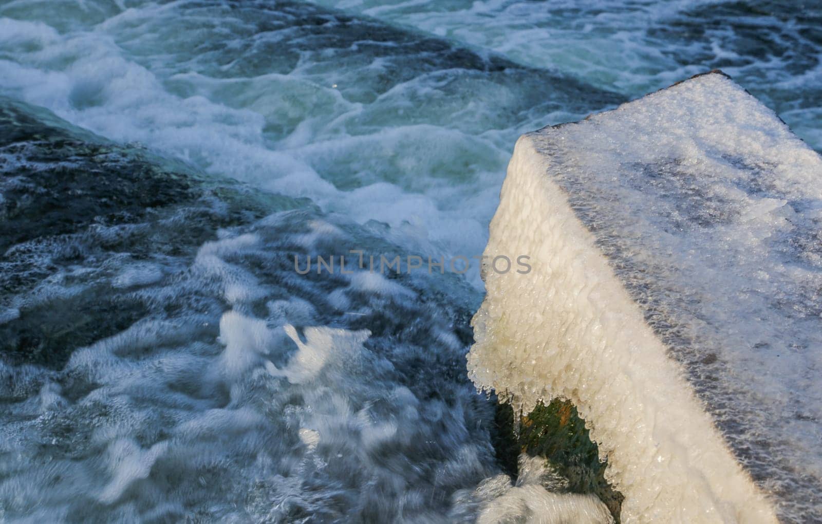 Water Cascading over Weir Step in river canal. by gelog67