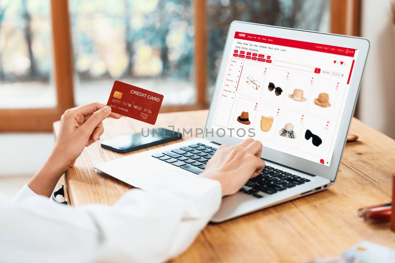 Woman shopping online on internet marketplace browsing for sale items for modern lifestyle and use credit card for online payment from wallet protected by uttermost cyber security software