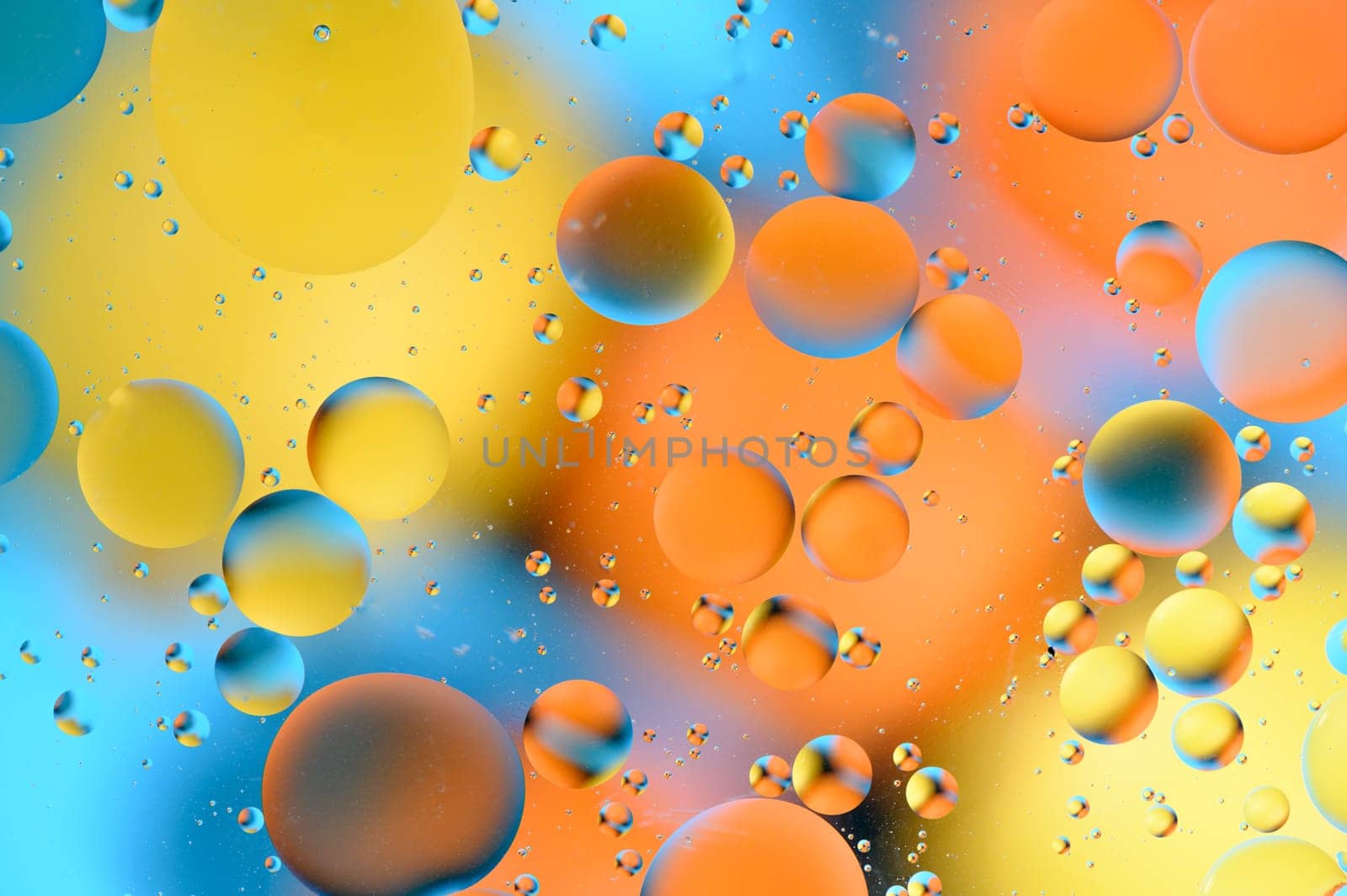 blue and orange spots with multi-colored circles similar to the galaxy and microcosm 1