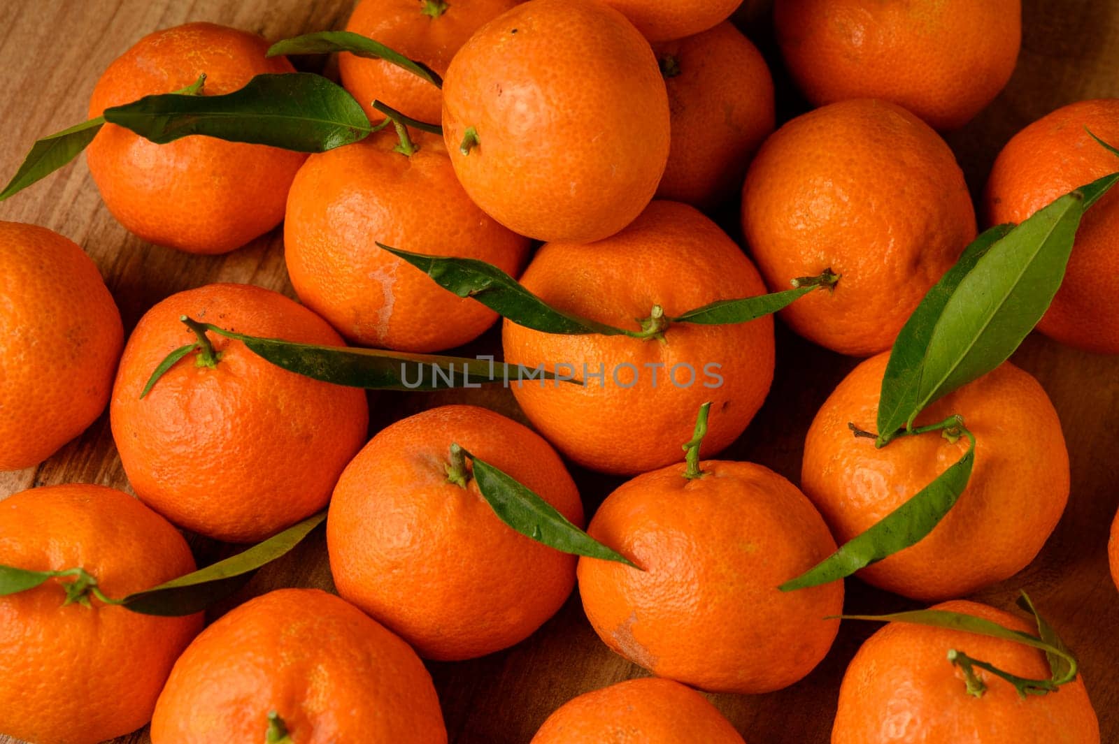 fresh juicy tangerines on a wooden table 13