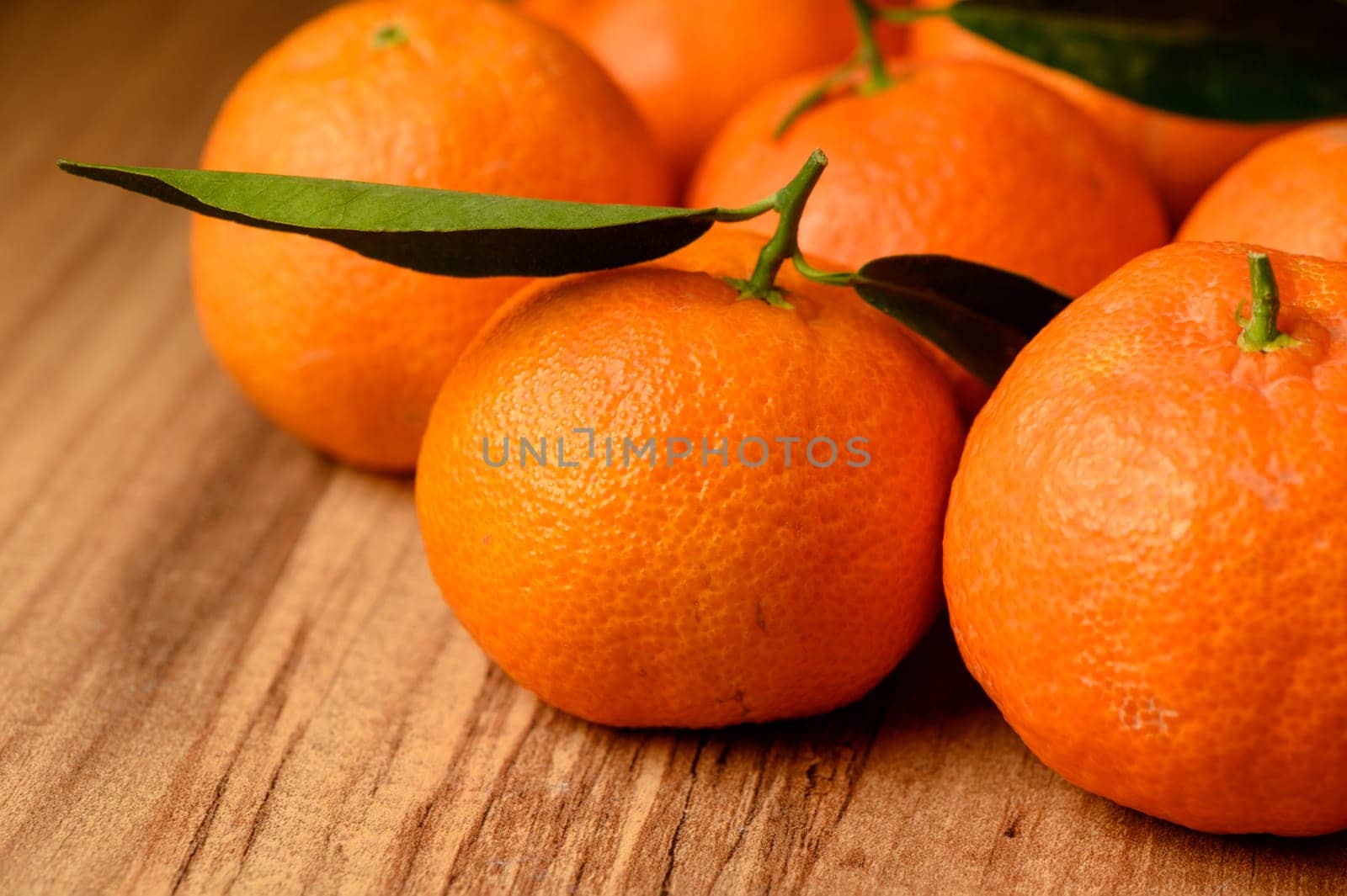 fresh juicy tangerines on a wooden table 11 by Mixa74