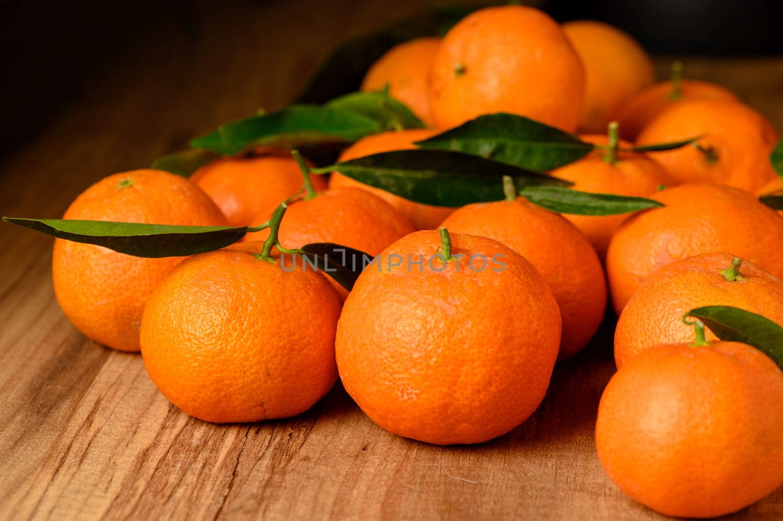 fresh juicy tangerines on a wooden table 7