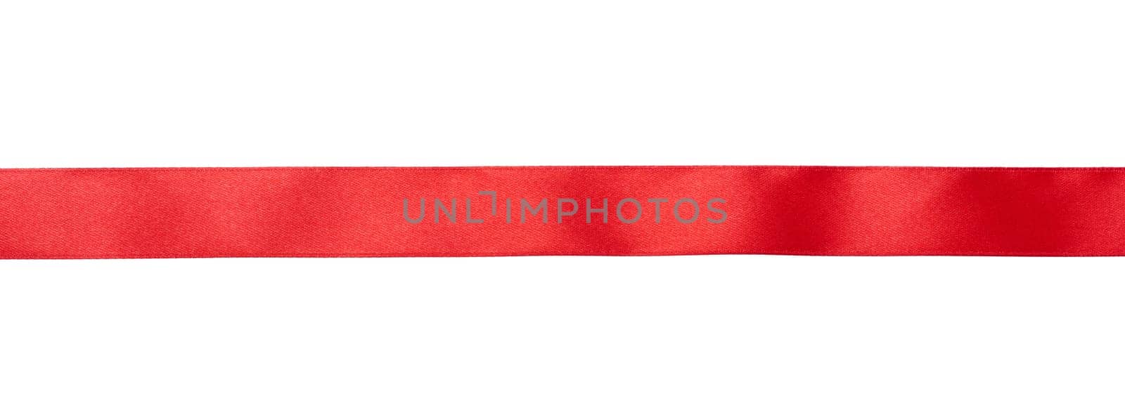 Red shiny ribbon on white isolated background