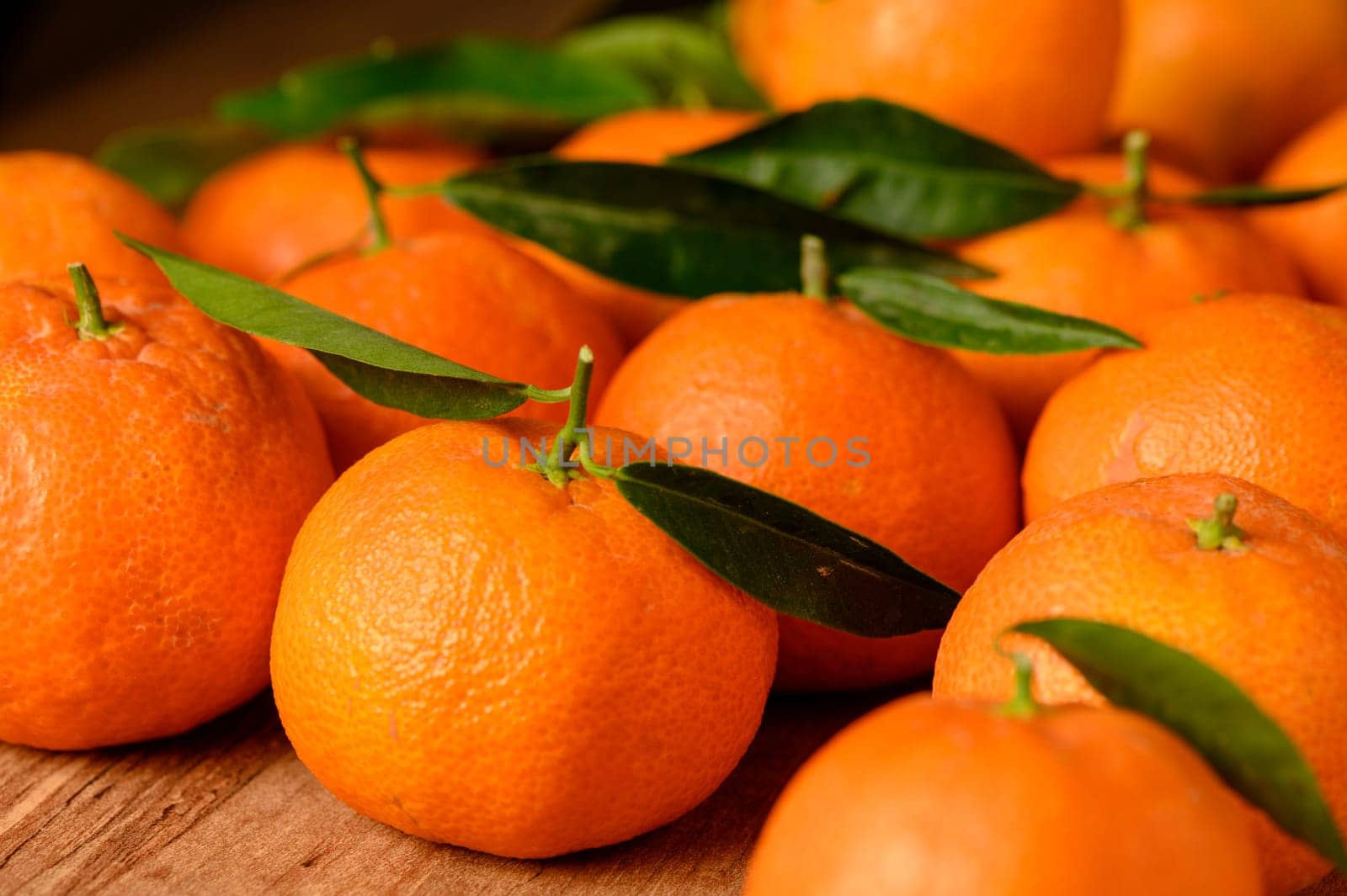 fresh juicy tangerines on a wooden table 4 by Mixa74