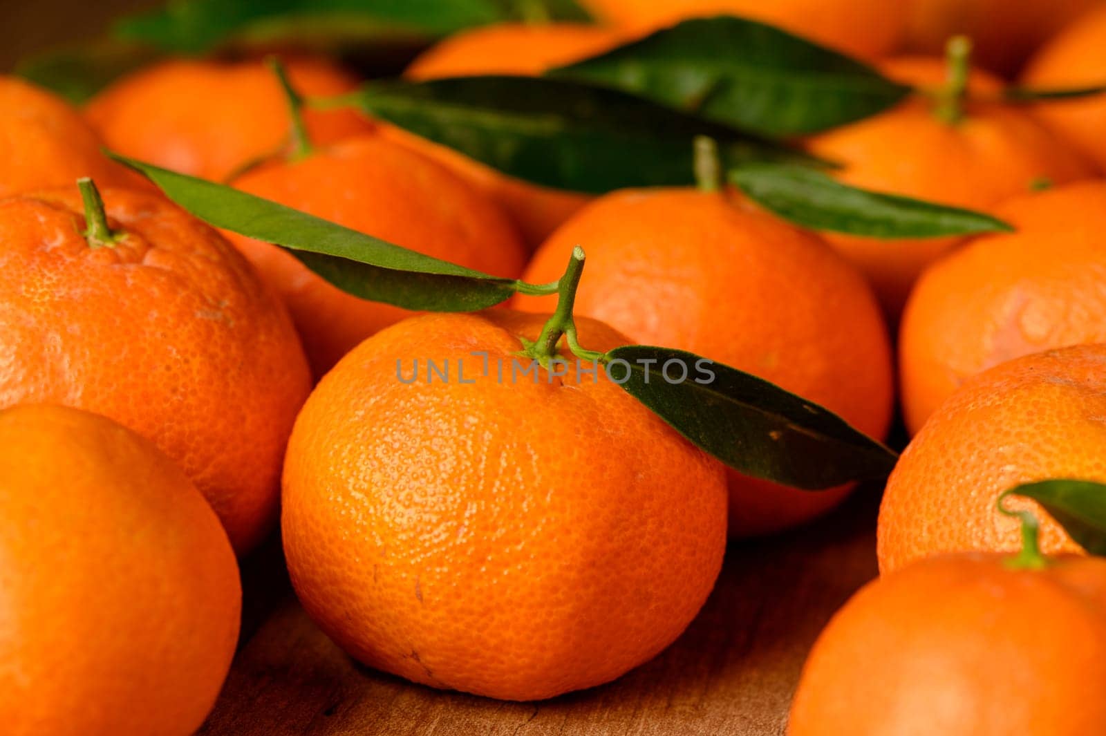 fresh juicy tangerines on a wooden table 1