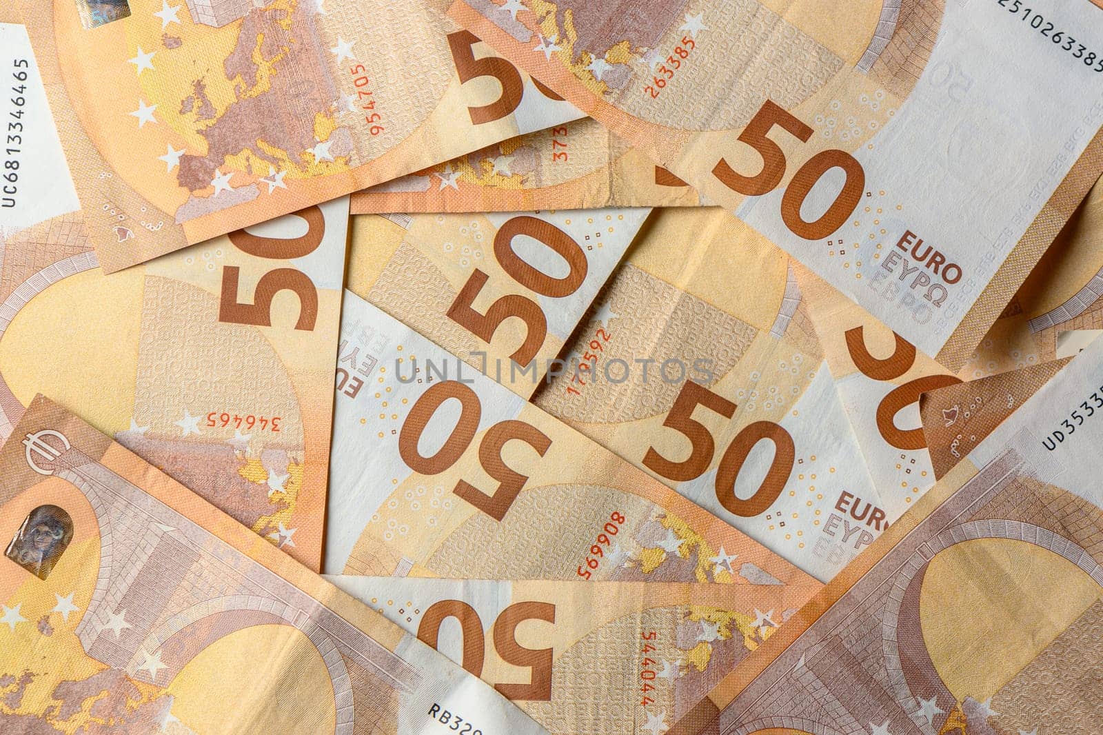 50 euro bills scattered on the table as a background 3