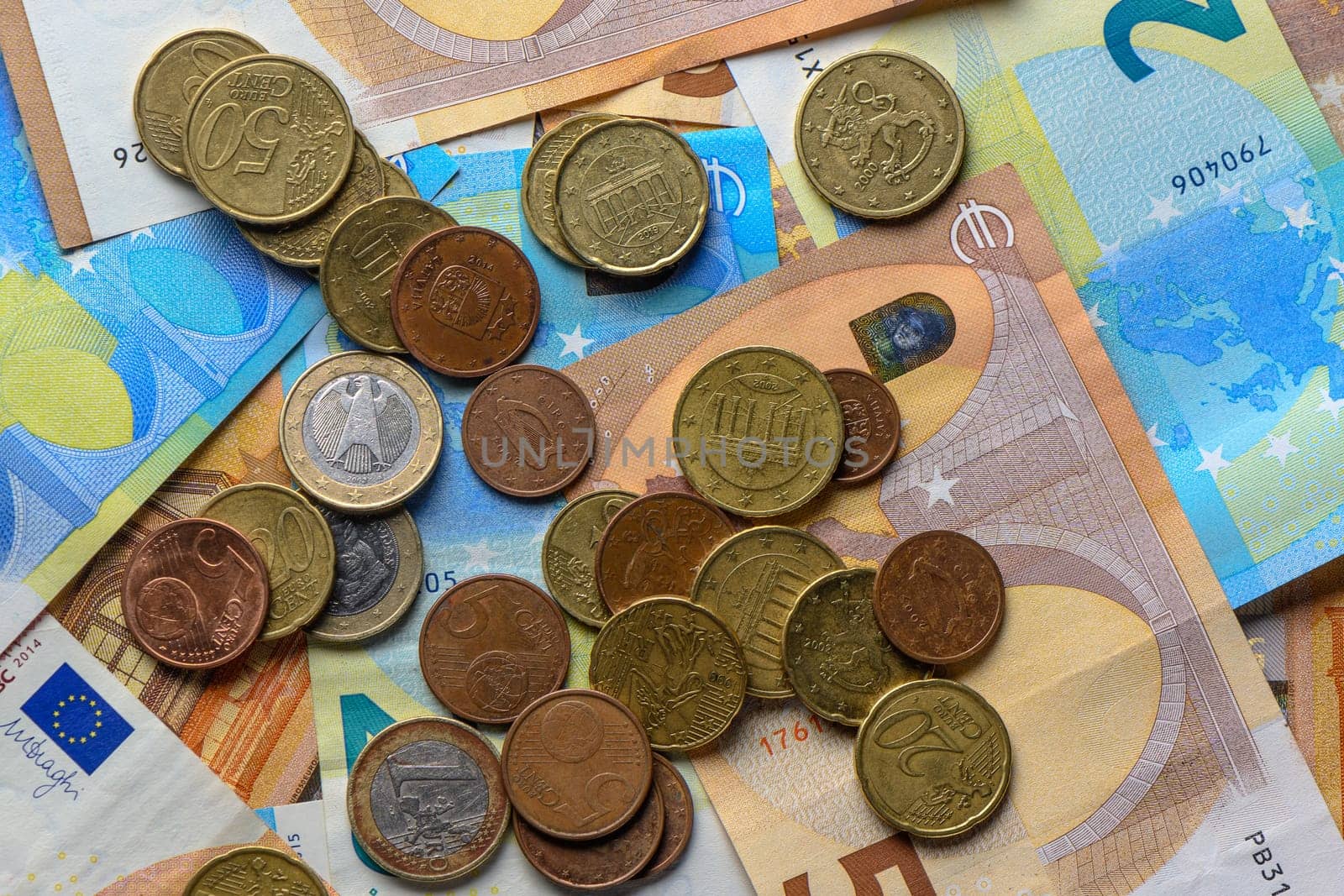 Euro bills and coins scattered on the table as a background 7 by Mixa74