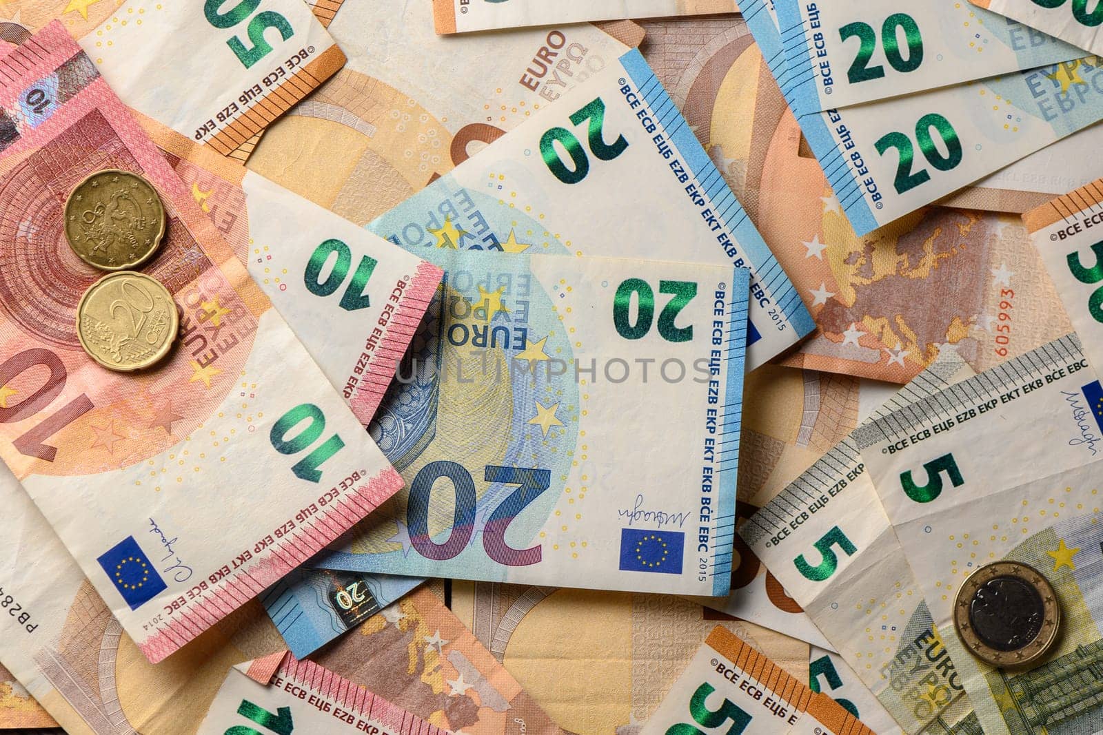 euro bills scattered on the table as a background 2 by Mixa74