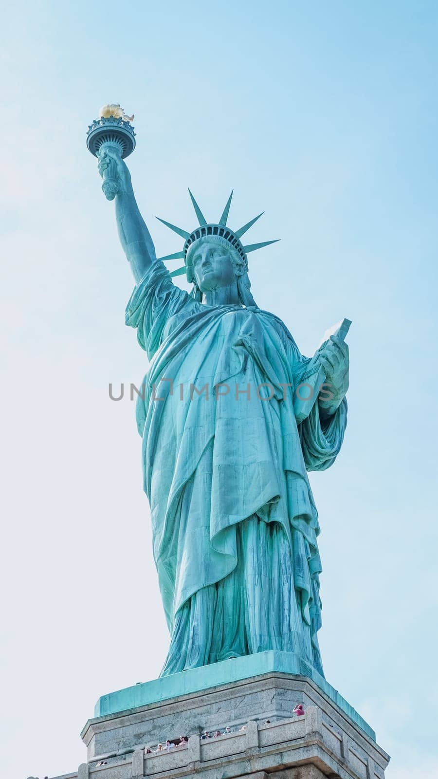 The Statue of Liberty, New York City on sunny blue sky. American symbol. Memorial day, Patriot Day. Space for text. New York NY USA 2023-07-30.