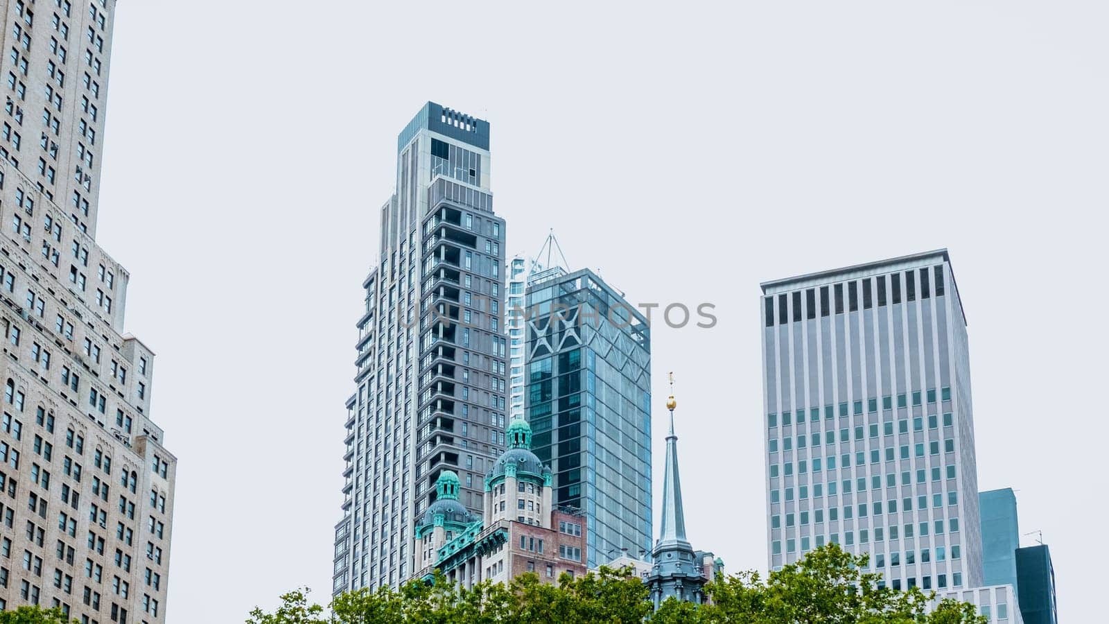 Skyscraper with glassy facade. Building in metropolis city. New York downtown with skyscraper. Business center.