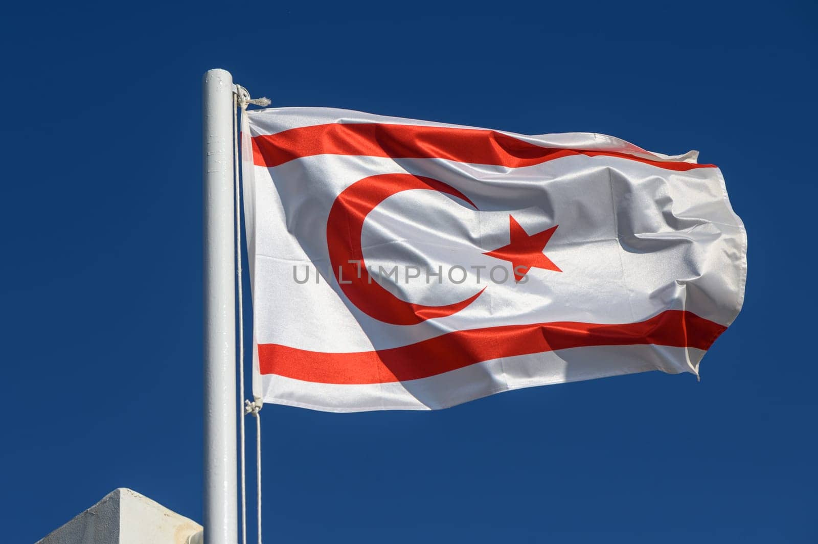 Northern Cyprus flag against blue sky 6 by Mixa74