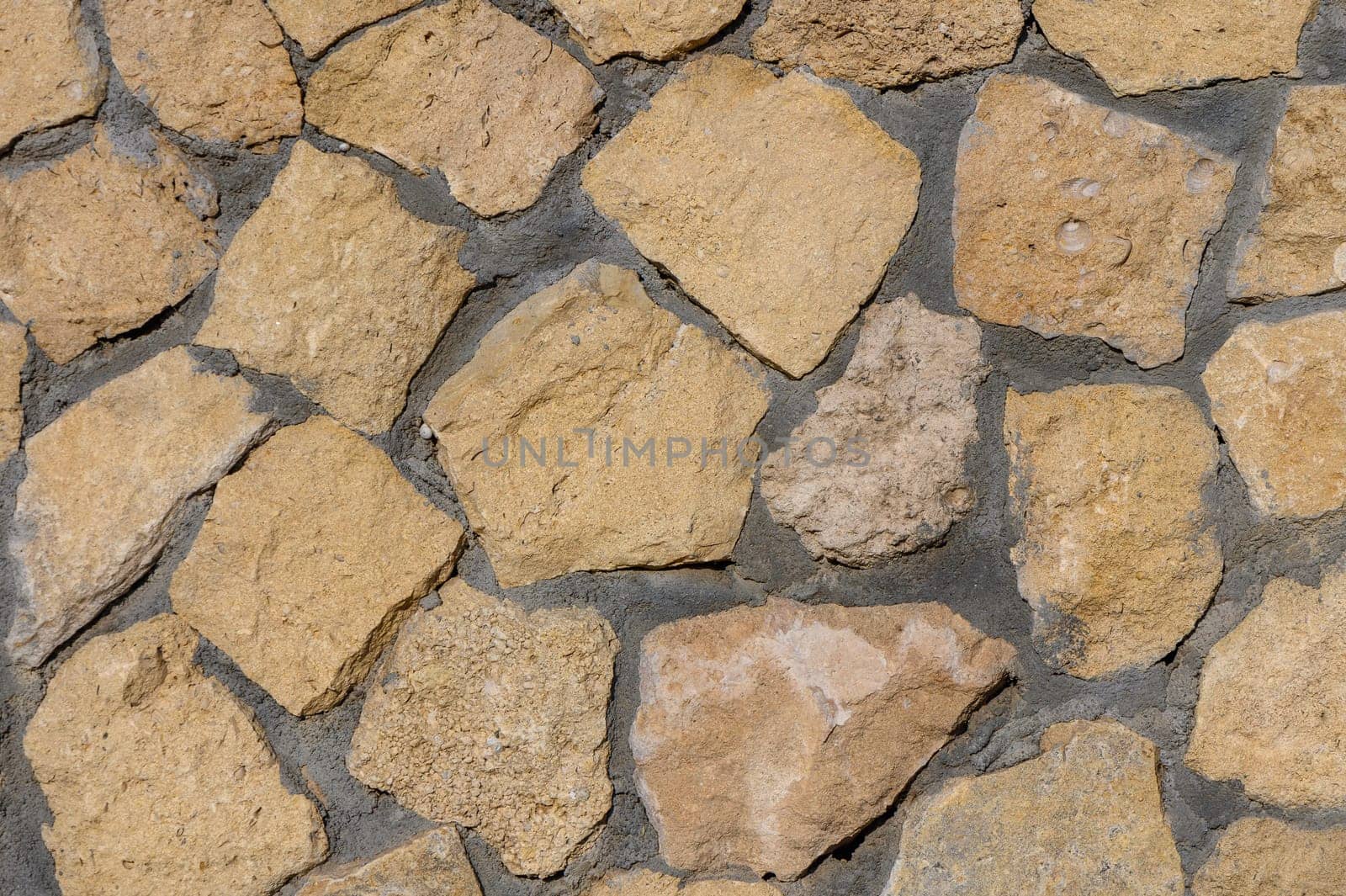 fence made of real stone as a background 2