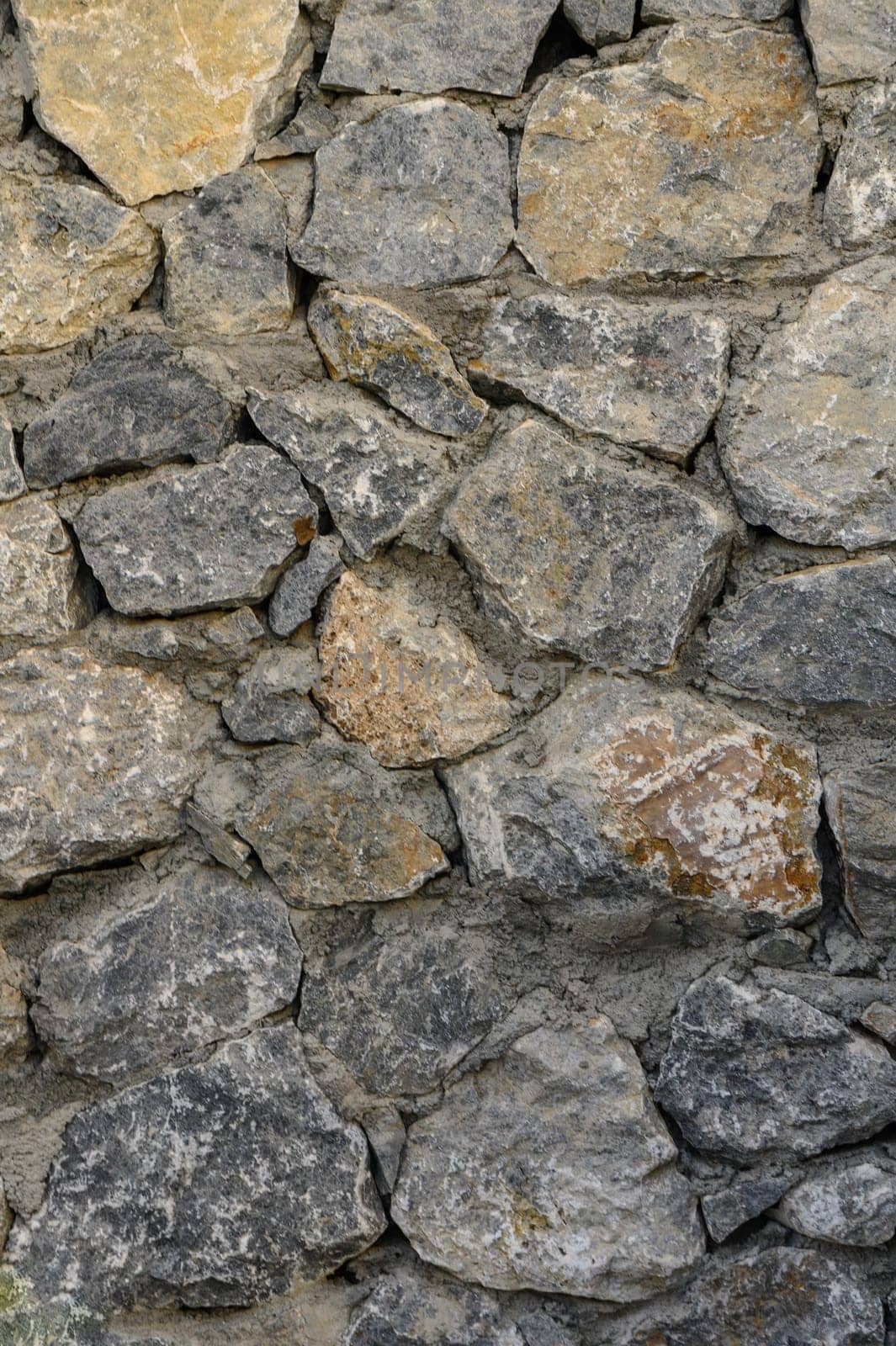 fence made of real stone as a background 3