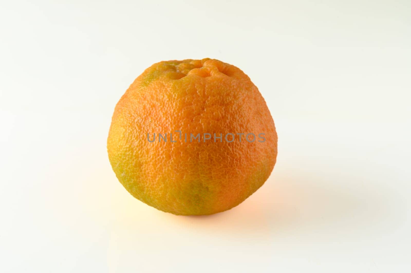 fresh appetizing tangerine on a white background