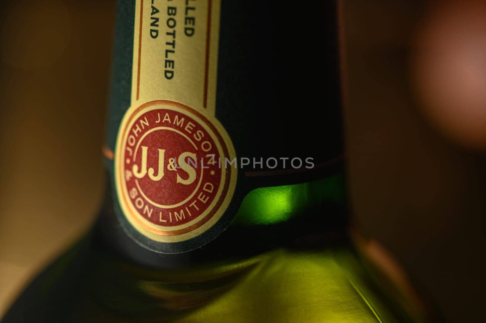 Ukraine, Chernigov 18/11/2023 - Bottle of Jameson whiskey on a background, beautiful color of whiskey 1 by Mixa74
