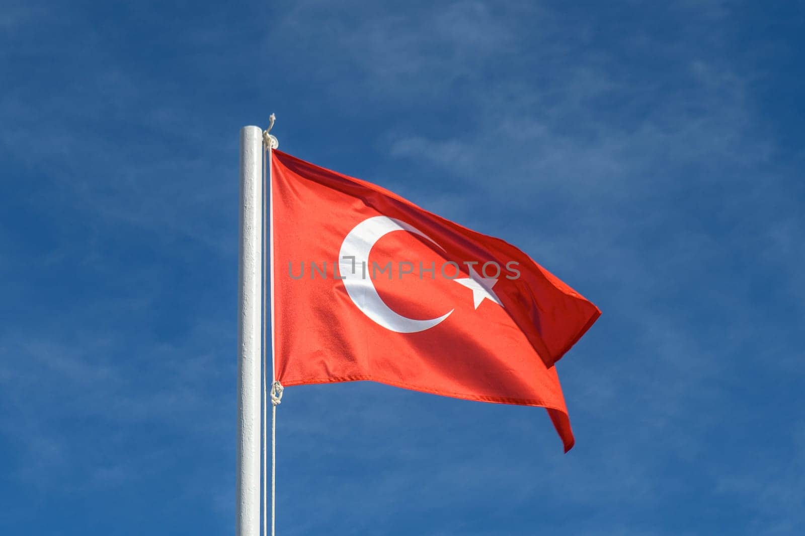 Turkey flag against blue sky