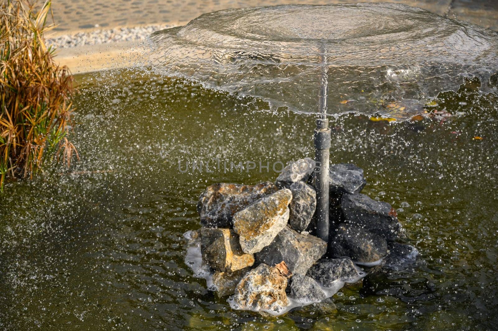 circle of water from a fountain spraying water 8