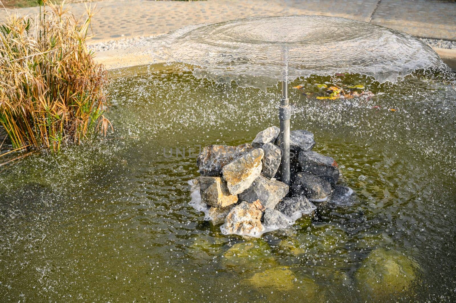 circle of water from a fountain spraying water 8 by Mixa74