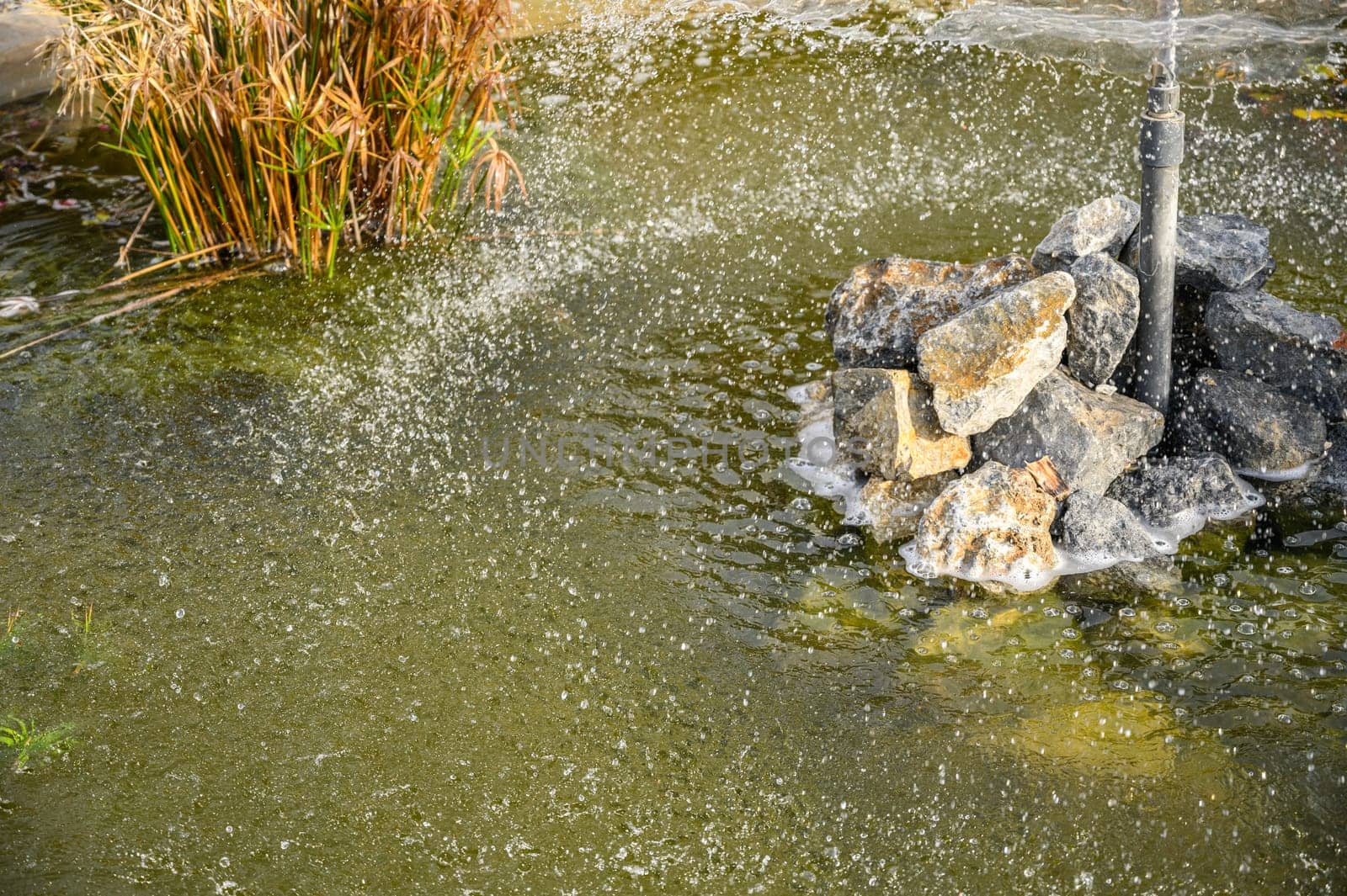 circle of water from a fountain spraying water 7 by Mixa74