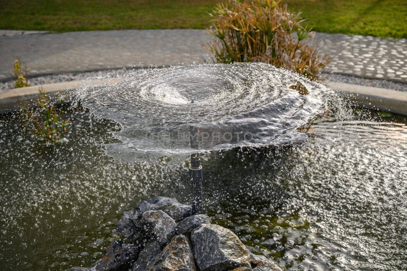 circle of water from a fountain spraying water 3 by Mixa74
