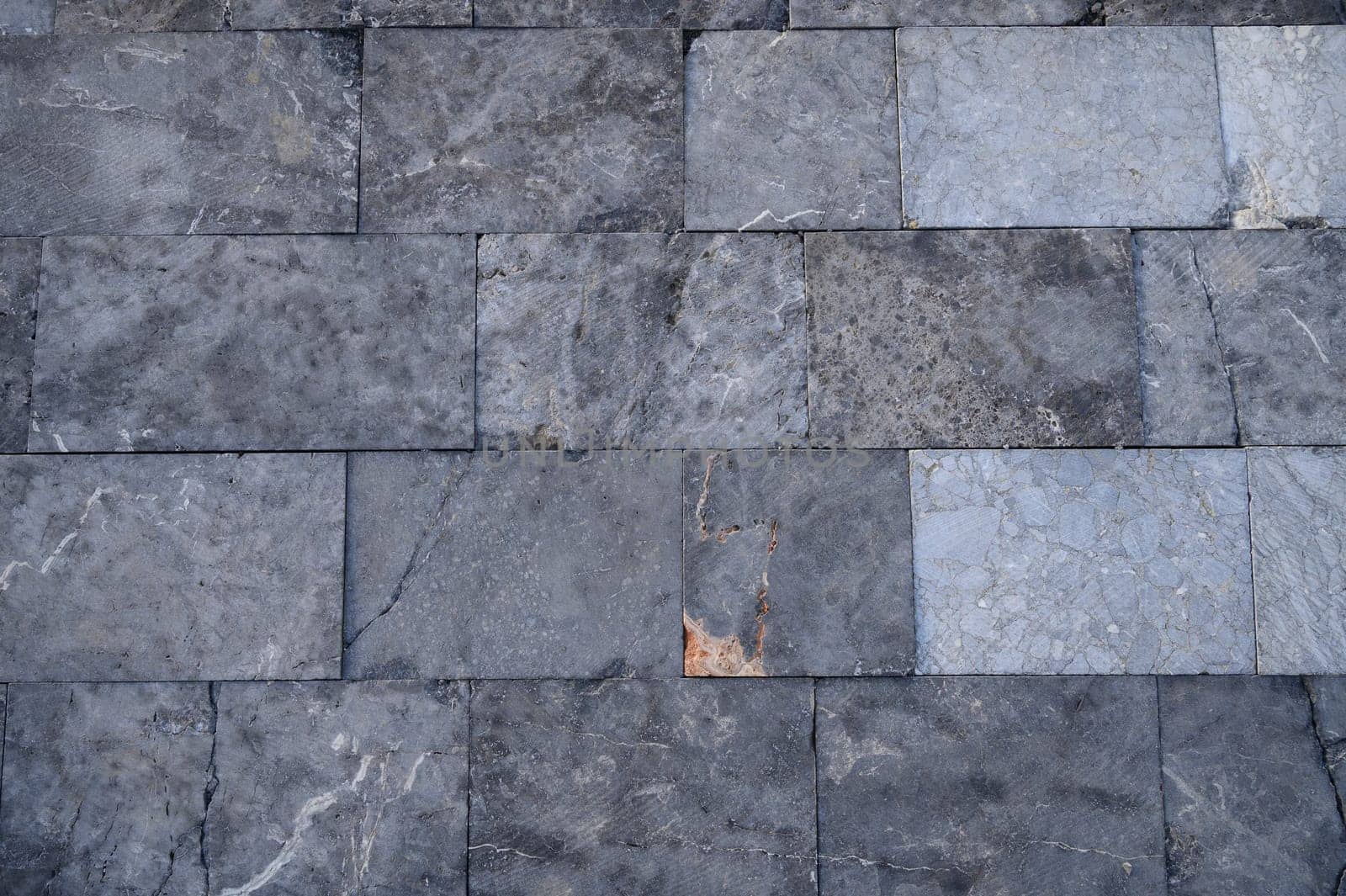 pavement path made of polished real stone as a background