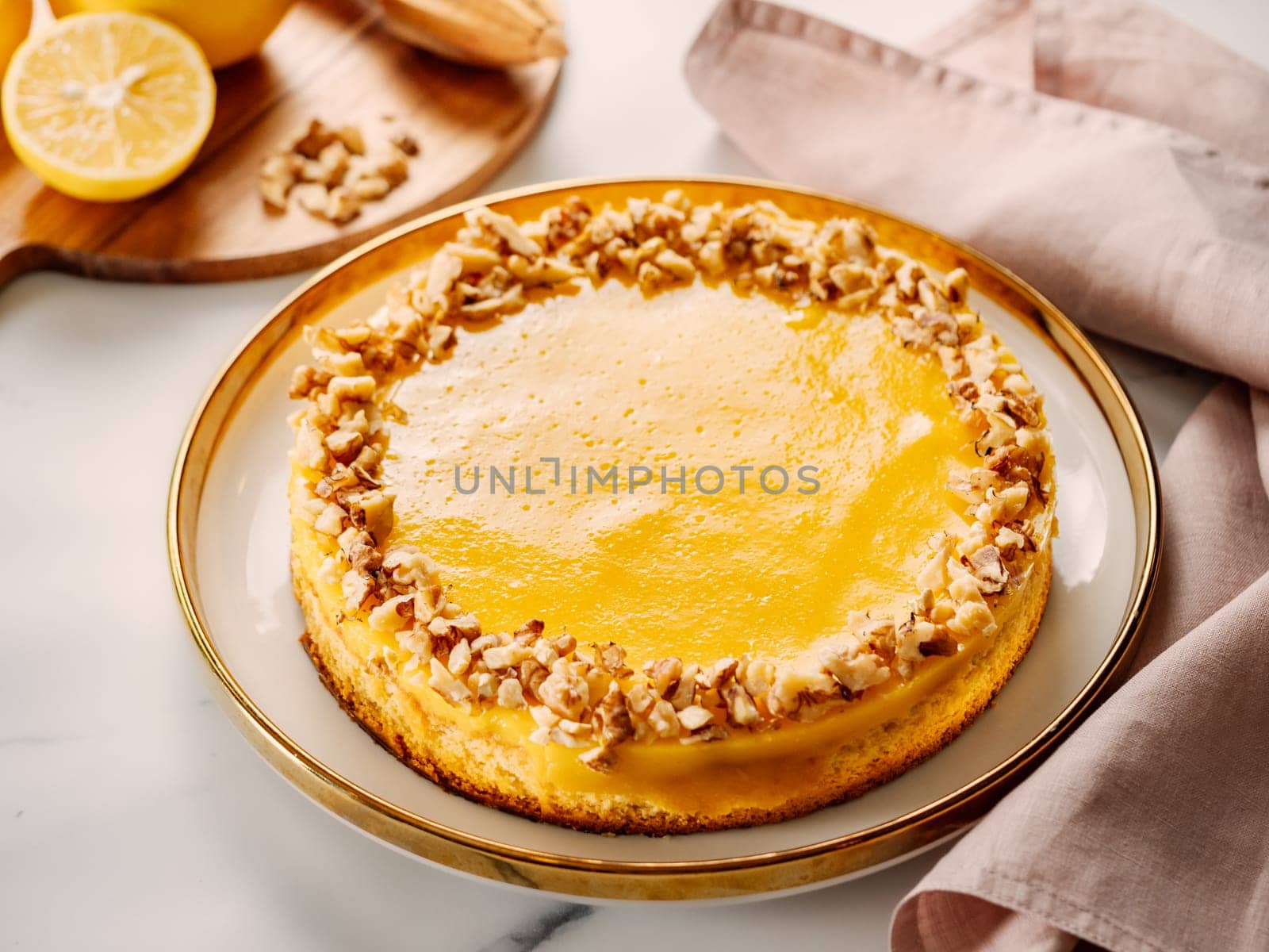 Vegan lemon tart or lemon cake, decorated walnuts by fascinadora