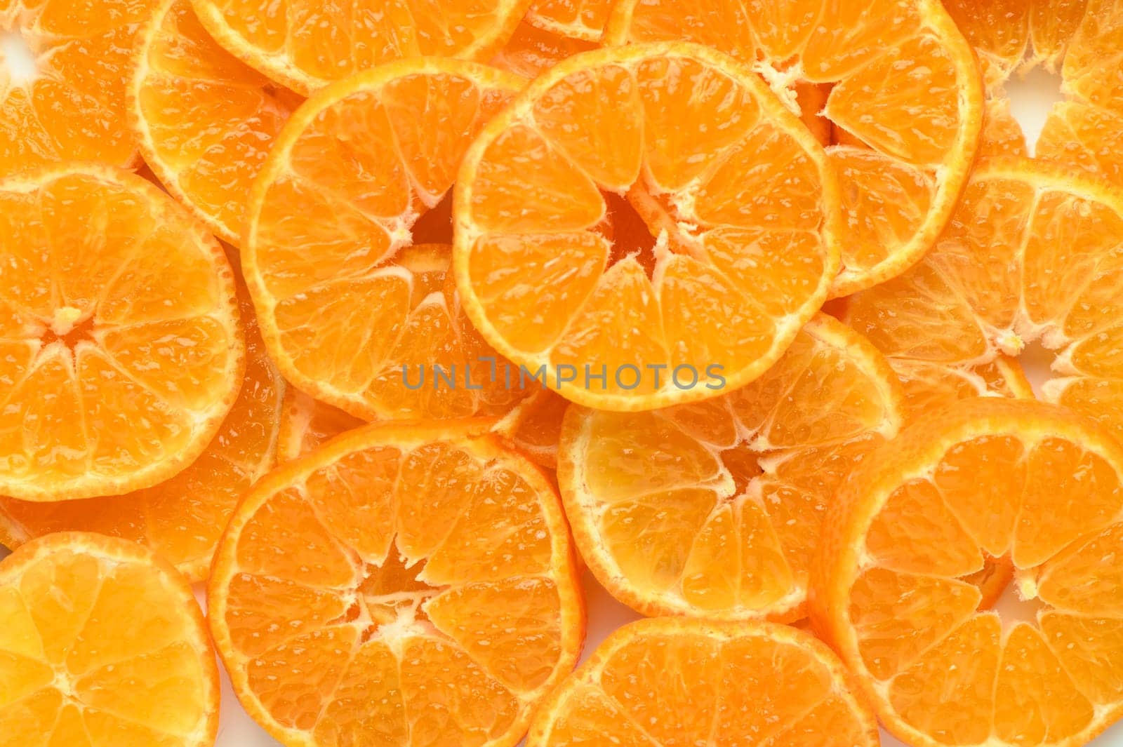 fresh juicy sliced ​​tangerines, background of sliced ​​tangerines 1 by Mixa74