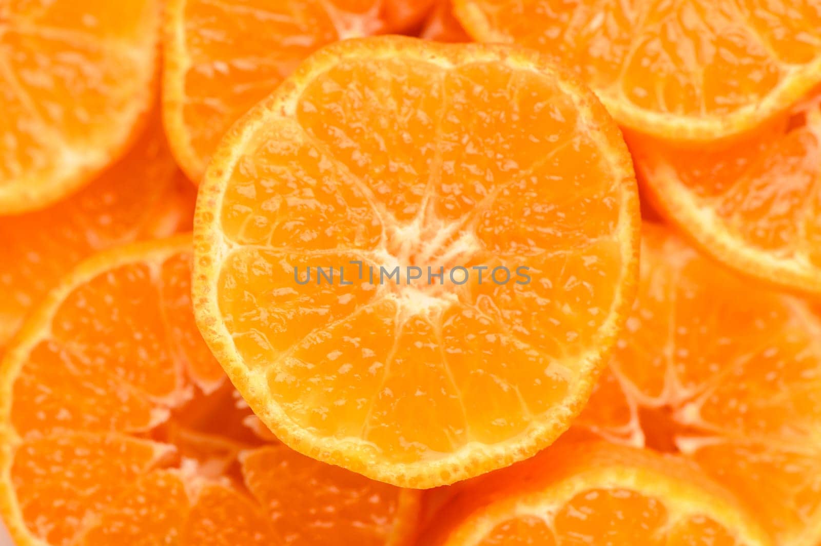 fresh juicy sliced ​​tangerines, background of sliced ​​tangerines 26 by Mixa74