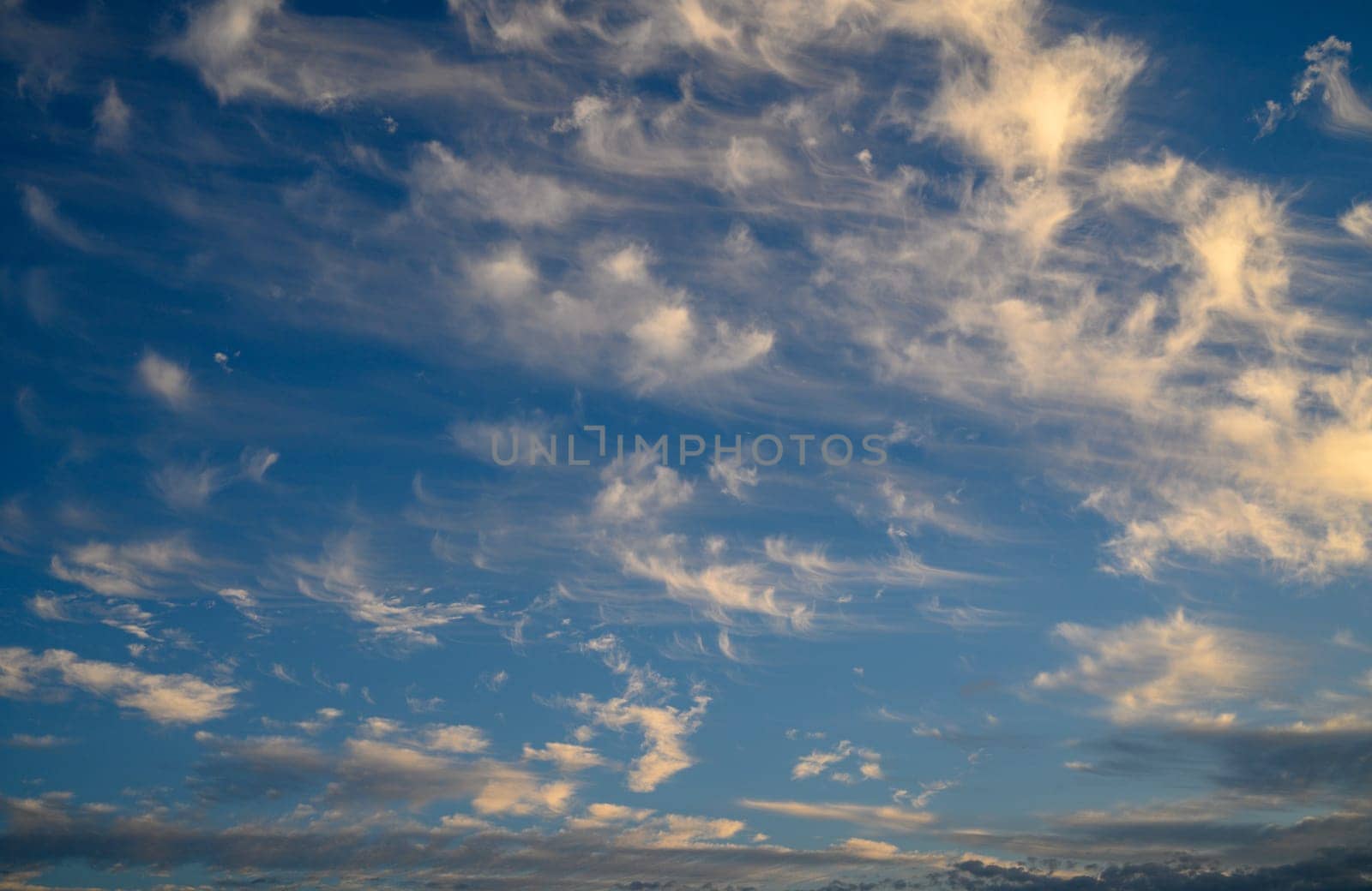 light overcast clouds in the winter Mediterranean sky at sunset 4