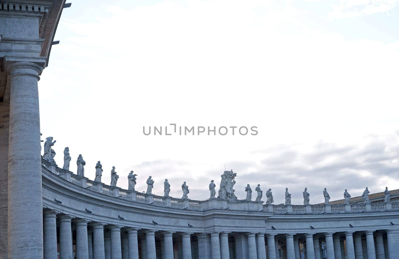 St. Peter's Square, Vatican, Rome, Italy View of the colonnade with statues of saints surrounding St. Peter's Square