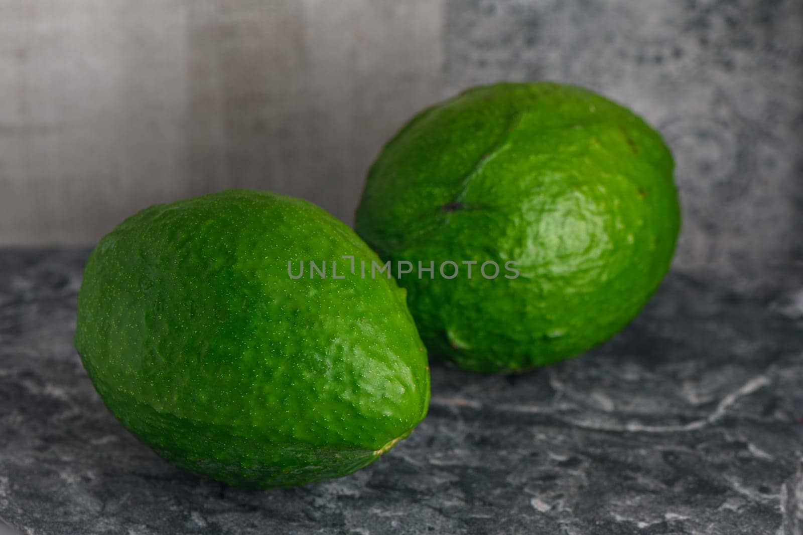 fresh avocado on a stone table