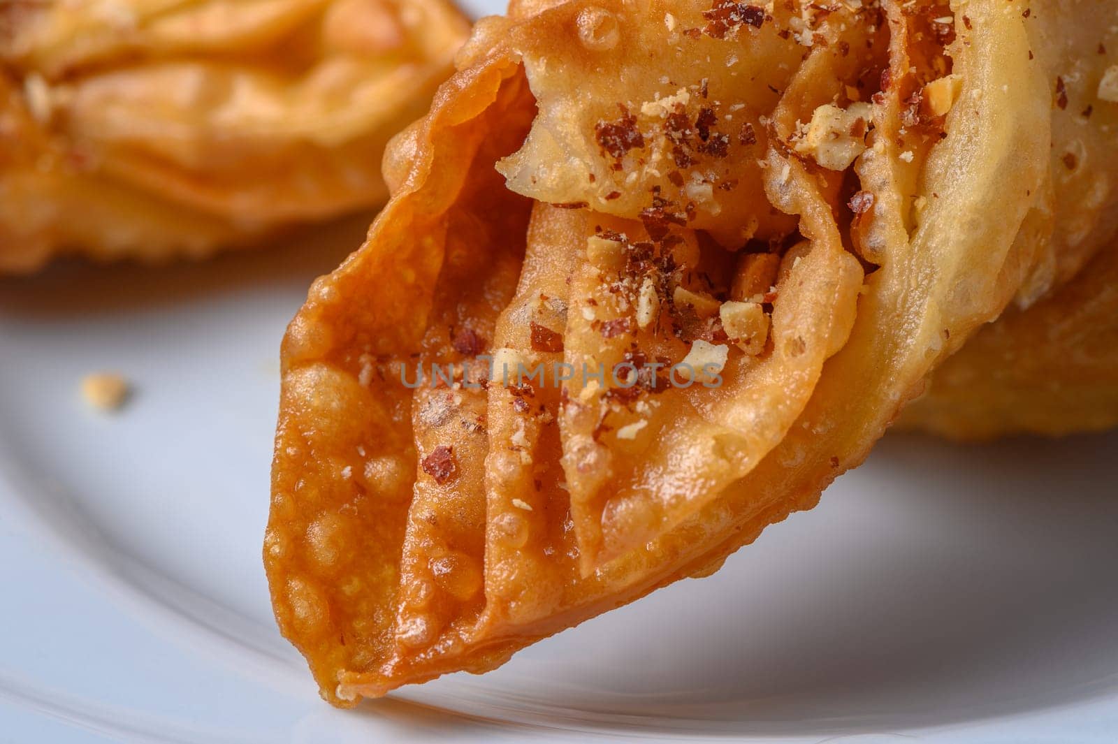 Turkish baklava, sweet dessert with honey on a light plate 11 by Mixa74