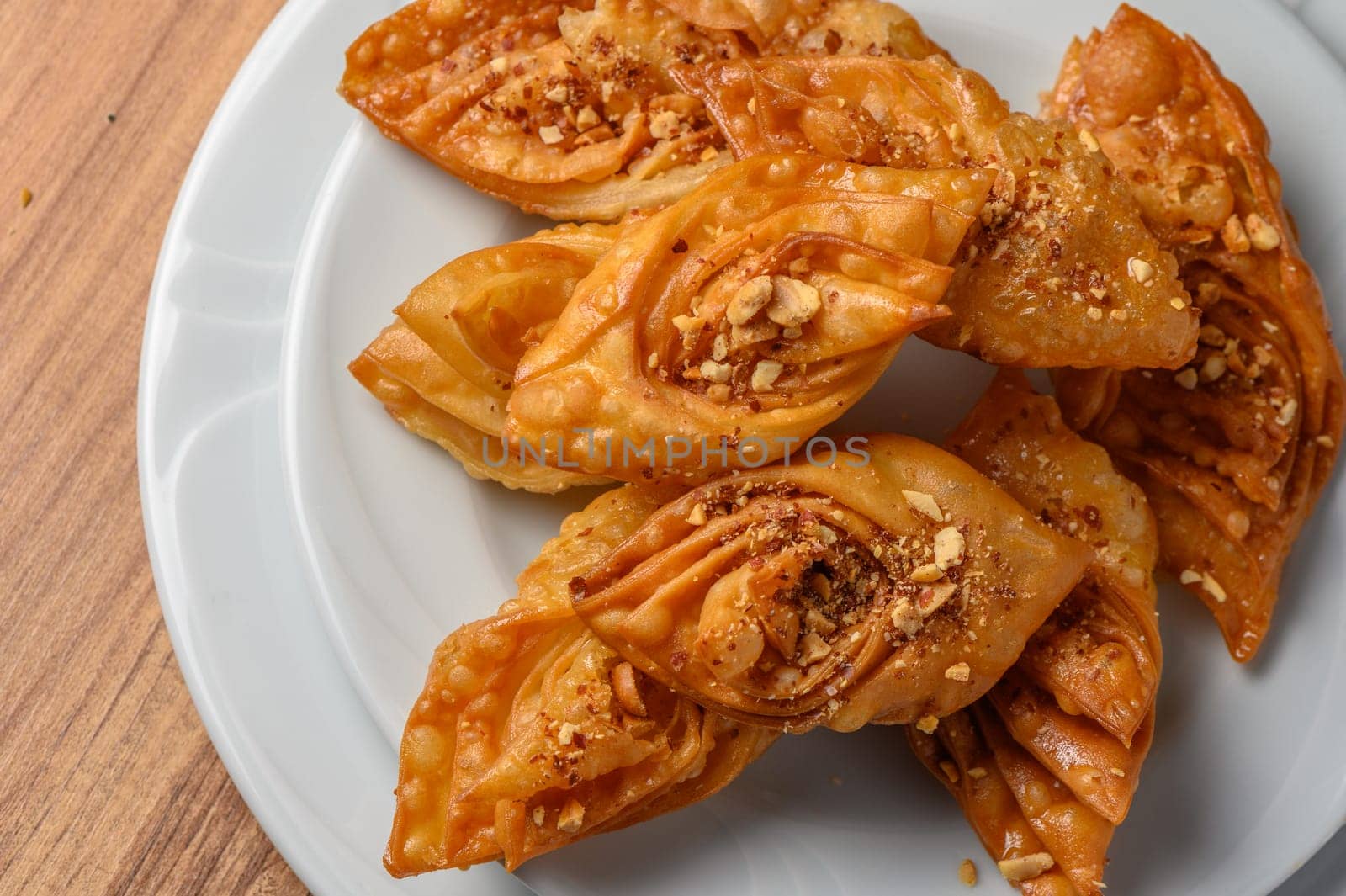 Turkish baklava, sweet dessert with honey on a light plate 22 by Mixa74