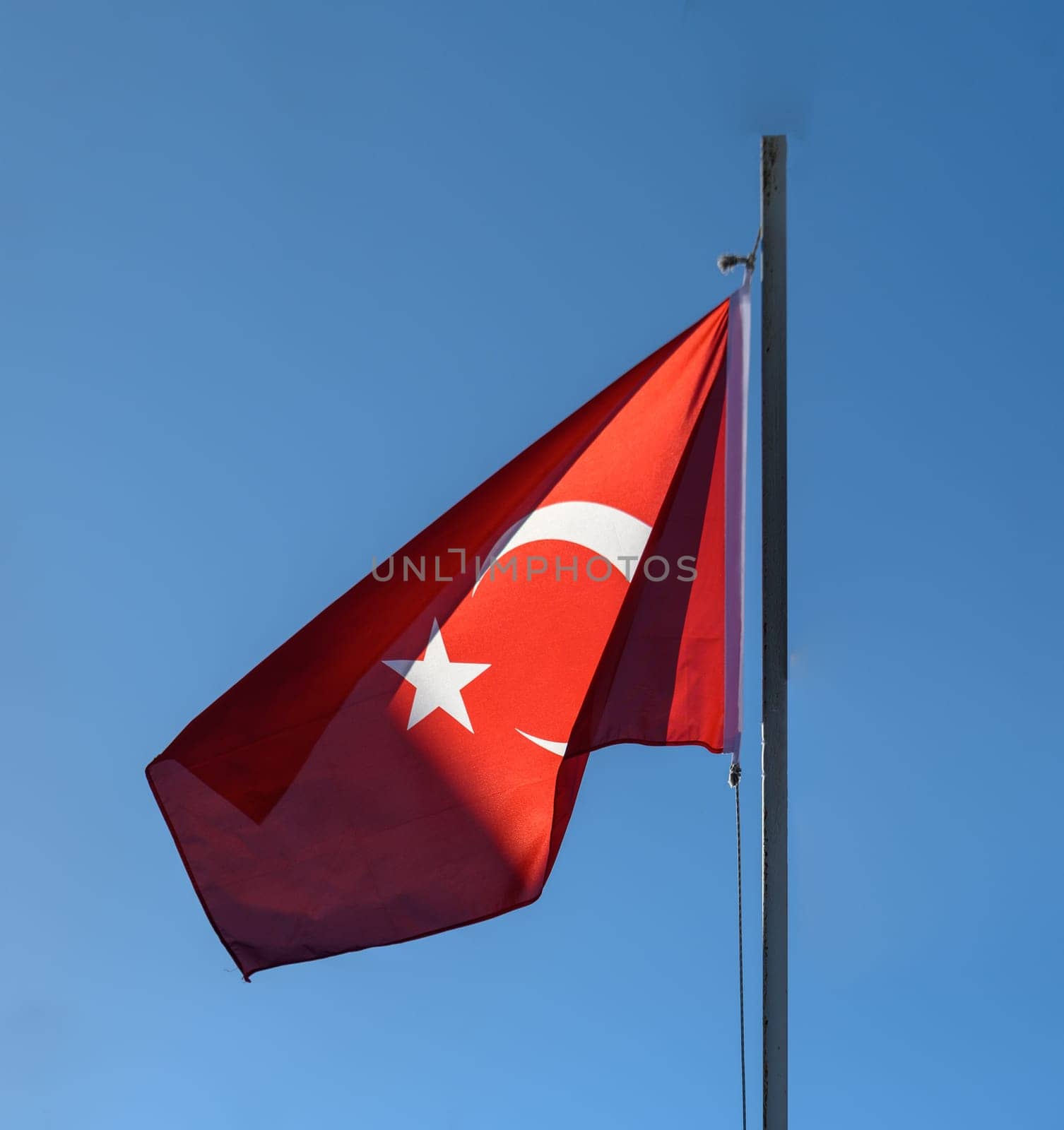 Turkish flag against blue sky 1 by Mixa74