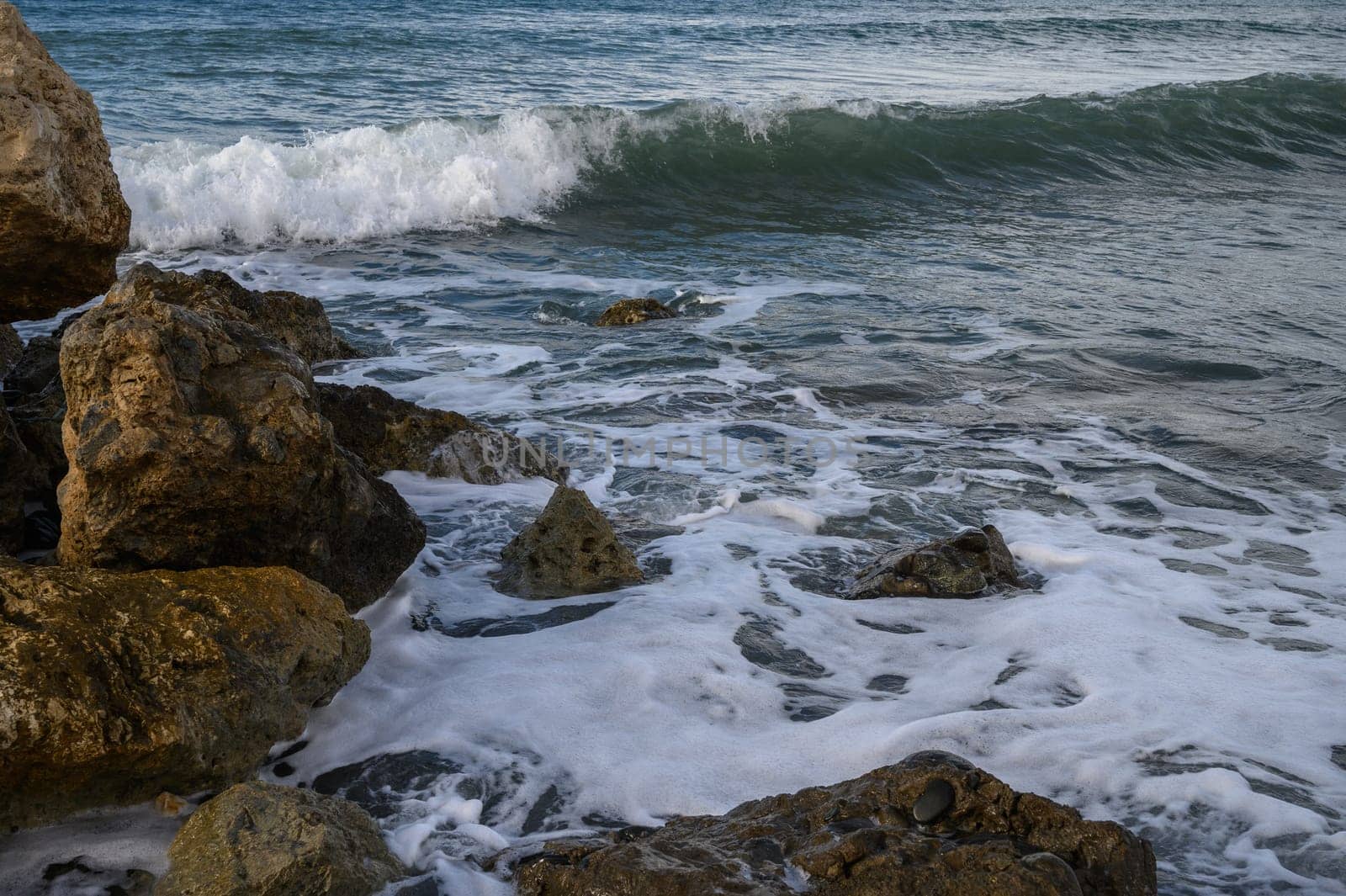 waves crashing on rocks on the Mediterranean coast 5