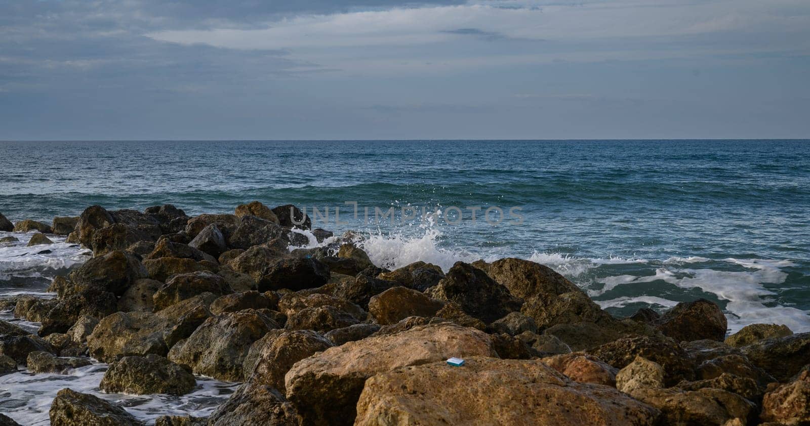 waves crashing on rocks on the Mediterranean coast 7