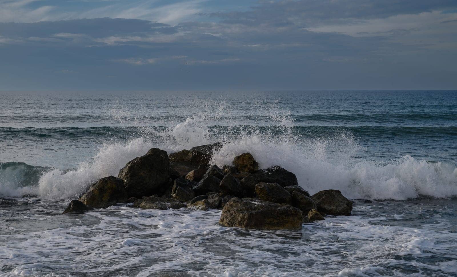 waves crashing on rocks on the Mediterranean coast 9
