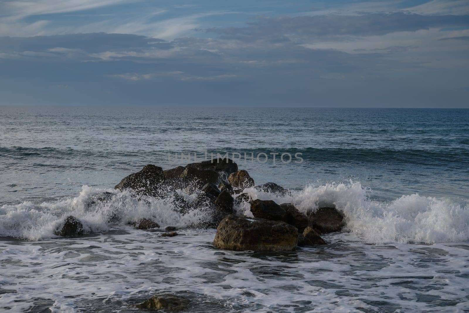 waves crashing on rocks on the Mediterranean coast 11