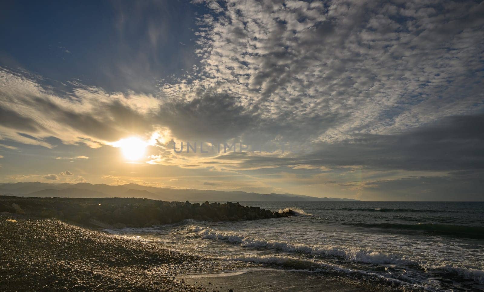 evening sun over mountains and Mediterranean sea 1